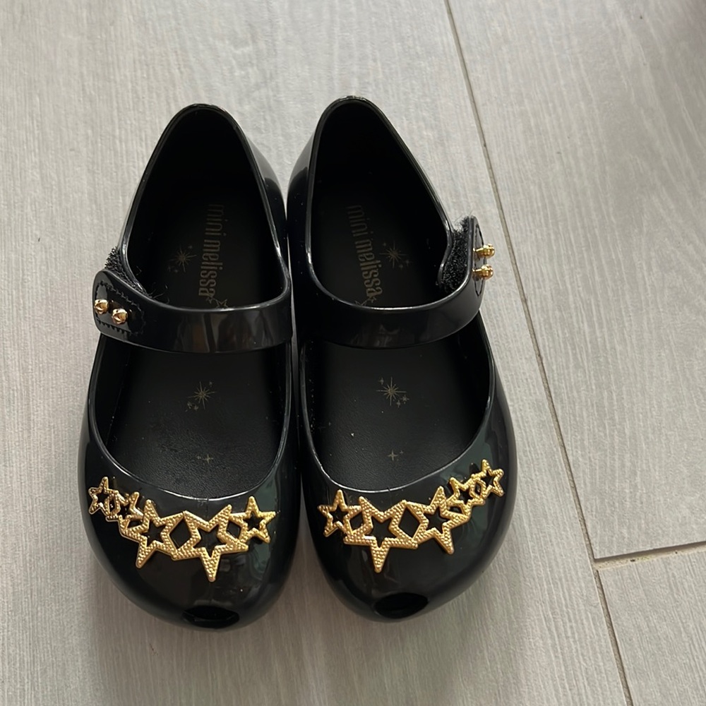 Like new mini Melissa black star 8